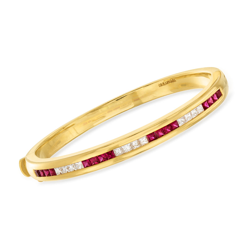 18kt yellow gold bangle bracelet with ruby and diamond row inlays
