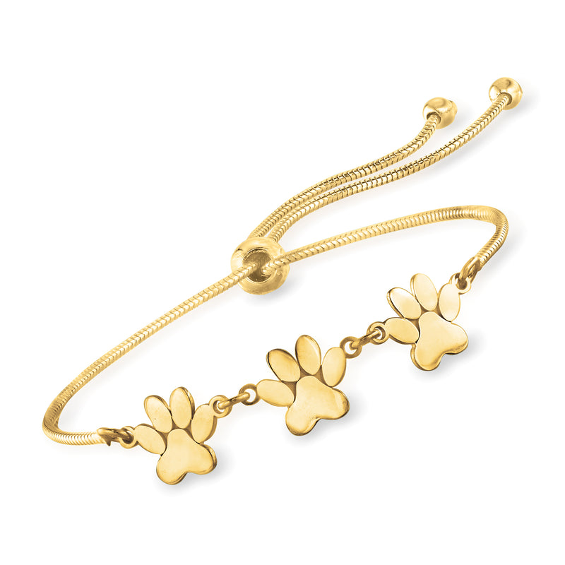Gold-tone bolo bracelet with three paw print charms and adjustable clasp