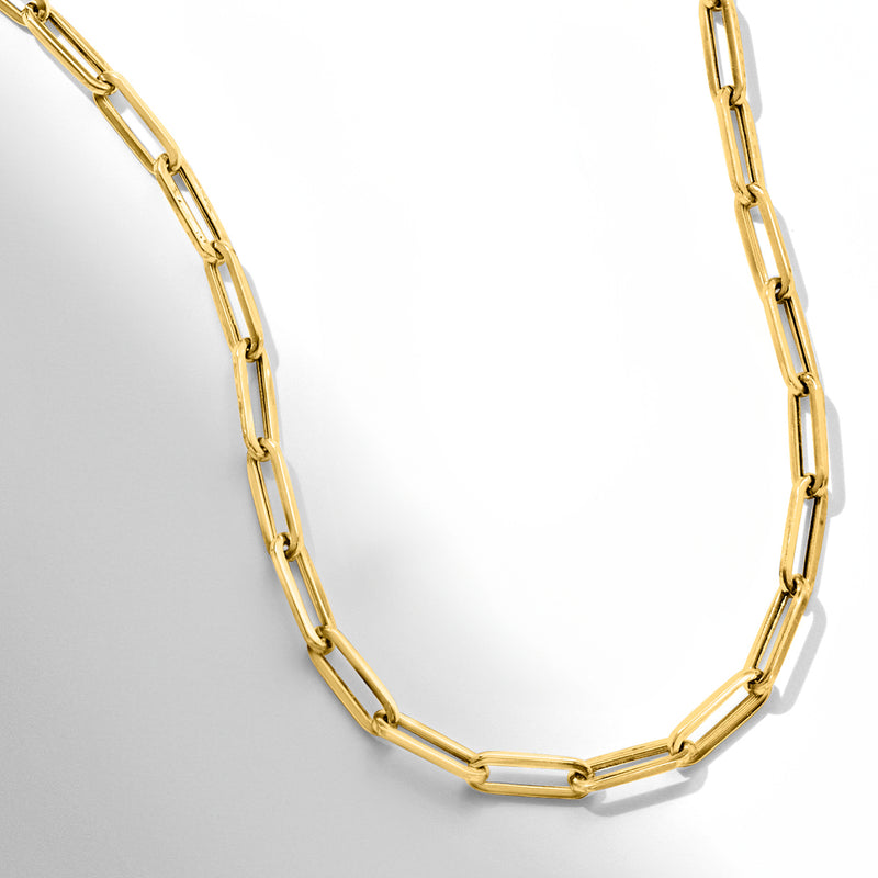 Yellow gold paper clip link necklace, curved close-up of interlocking rectangular links