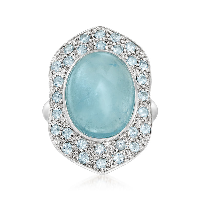 Sterling silver aquamarine oval ring with sky blue topaz halo
