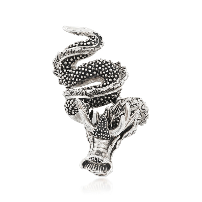 Sterling silver dragon wrap ring with dark stone accents and engraved scales