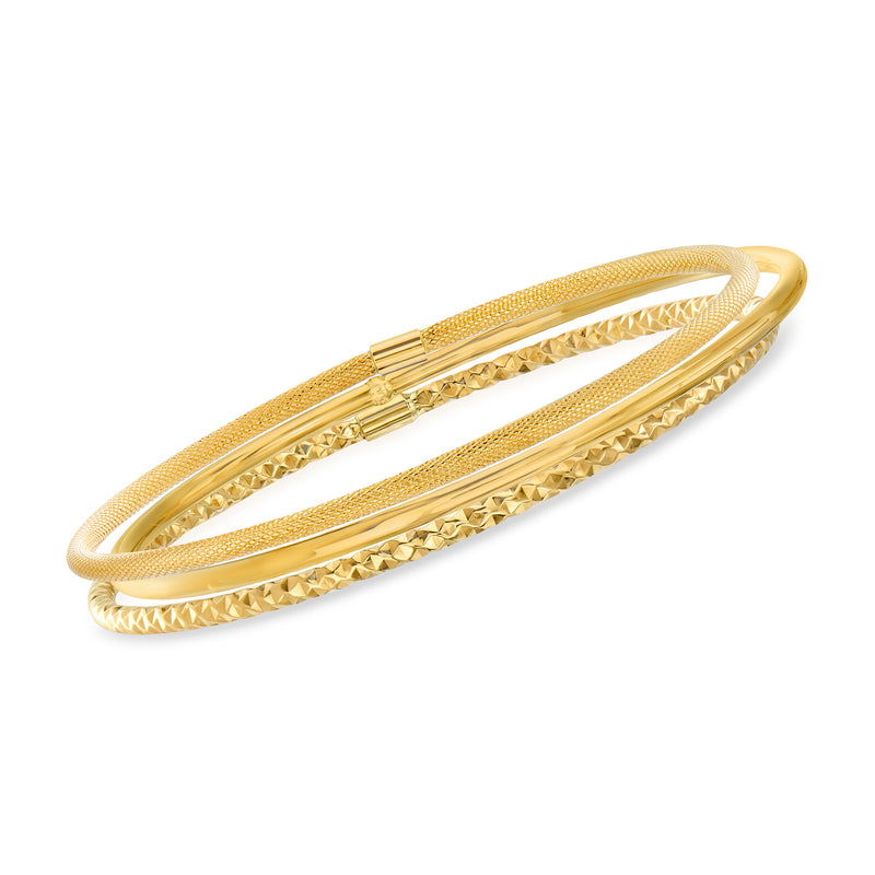 Three 14kt yellow gold bangles with mixed textures and finishes, stacked together.