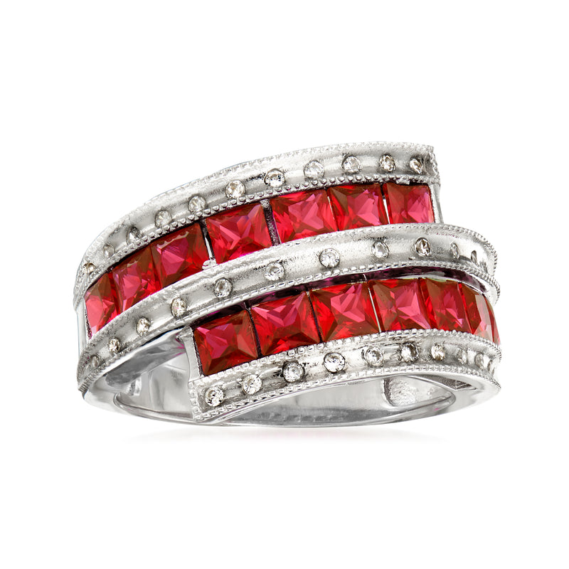 Sterling silver ring with red simulated ruby-style stones and clear CZ accents