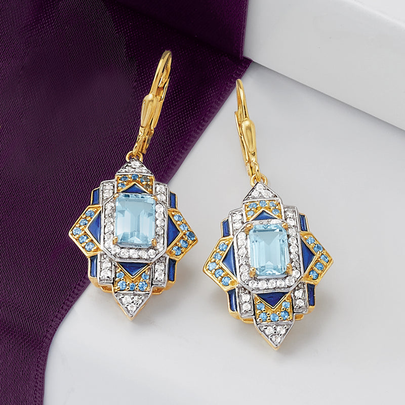 Blue and white topaz-style drop earrings with gold leverback and halo enamel settings