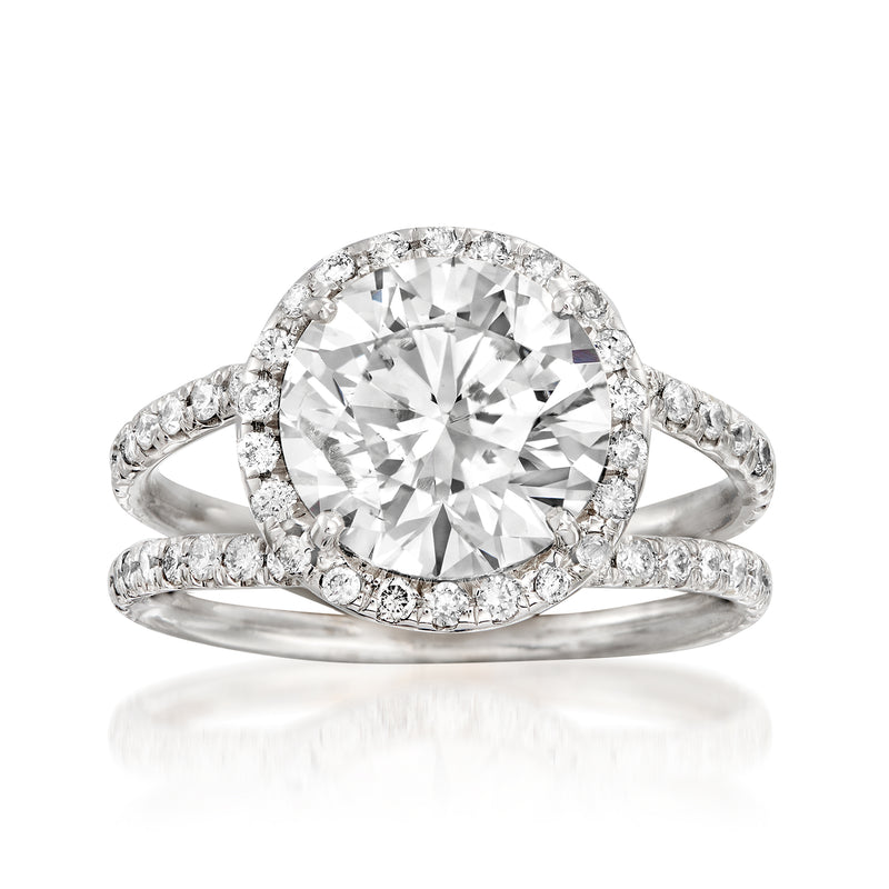 4.22 ct. t.w. diamond halo ring in 18kt white gold with round center stone