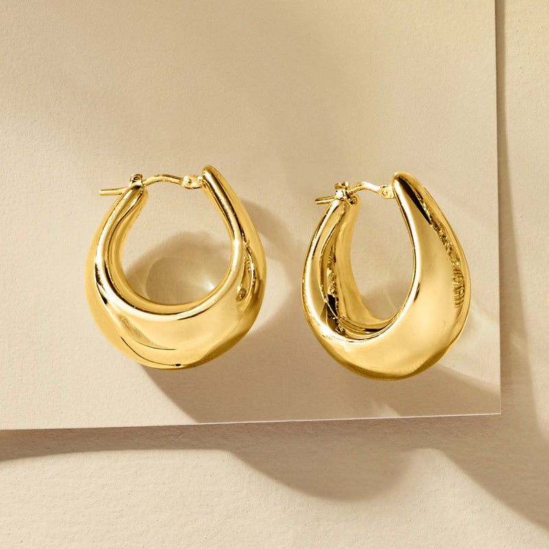 Wide gold over sterling hoop earrings, polished oval hoop with clasp detail
