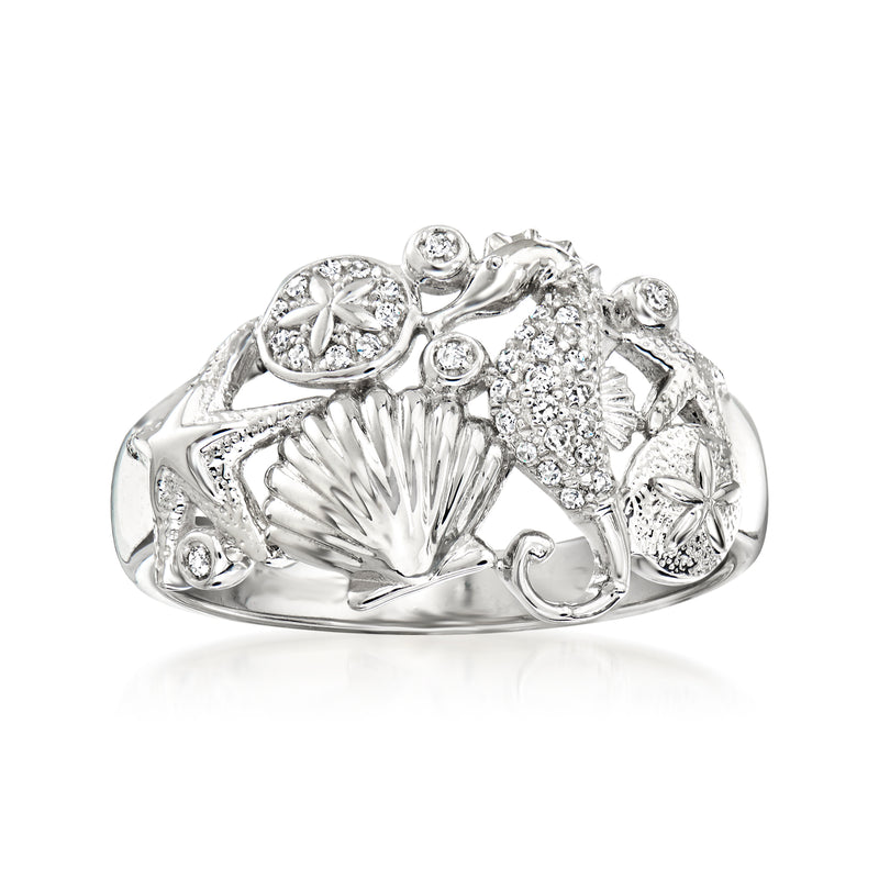 Sterling silver sea life diamond ring with shell design and round stones, side view