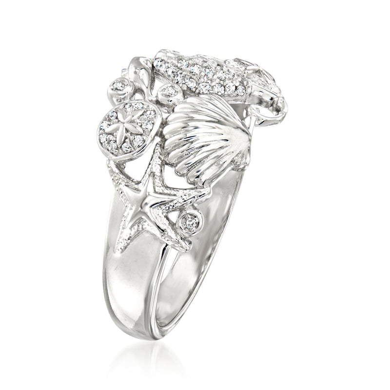 Sterling silver sea life diamond ring with shell and starfish charms, top view