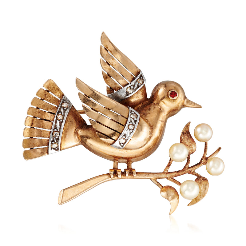 18kt yellow gold bird on branch pin with pearls, red ruby eye, and diamond accents