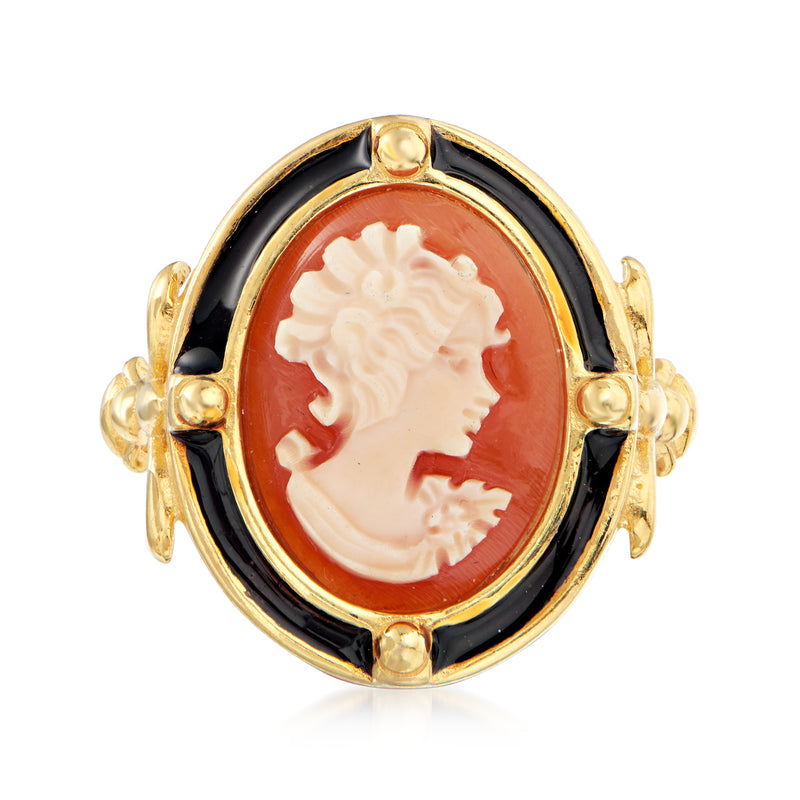 Oval orange cameo ring with white shell profile, black enamel border, gold-tone bezel setting