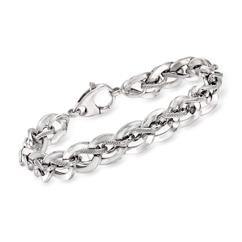 Sterling silver oval-link bracelet with hinged clasp and polished oval links