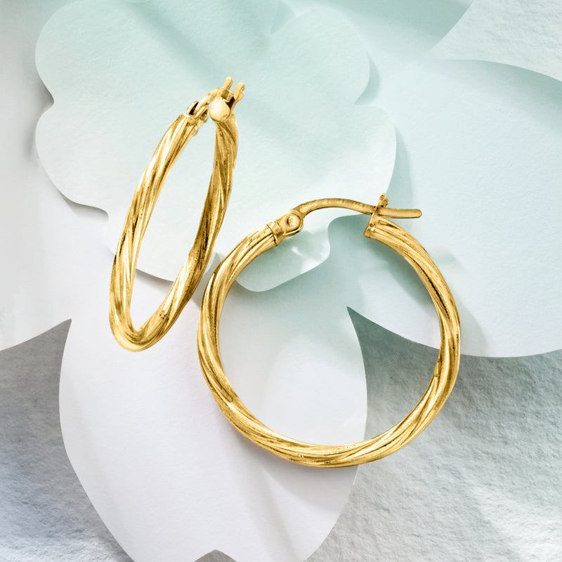 Twisted 14kt yellow gold hoop earrings, oval hoops with ridged twisted texture