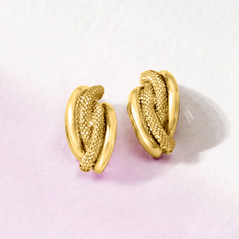 Textured and polished yellow gold hoop post earrings, side view