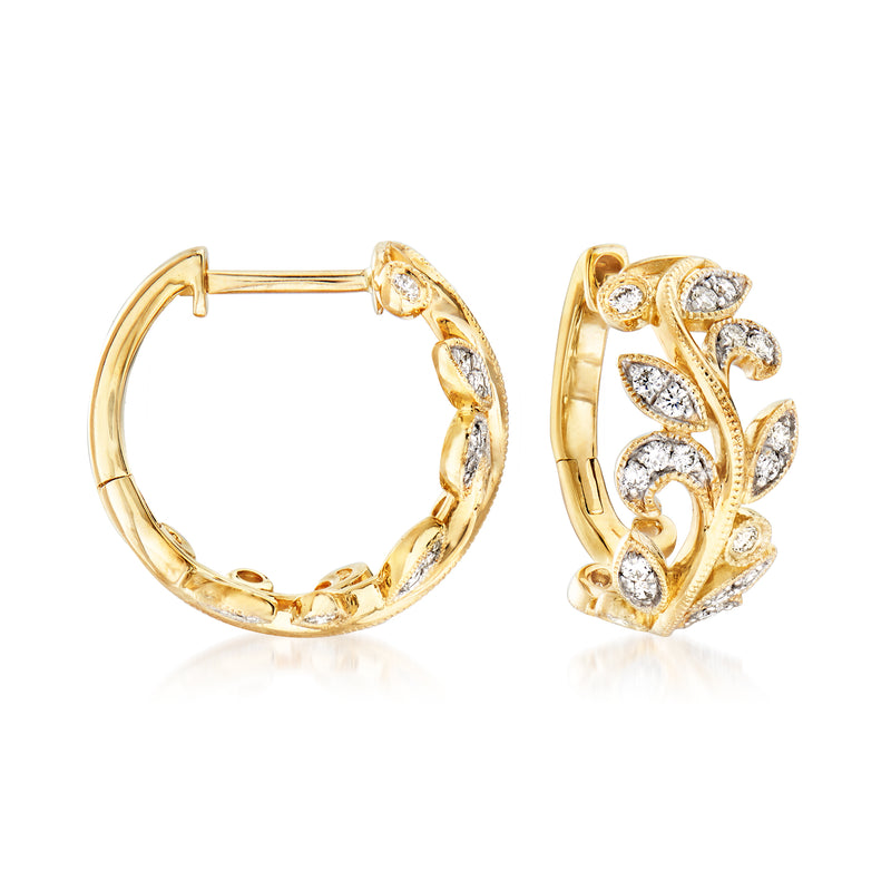 14kt yellow gold hoop earrings with diamond leaf cluster detail and small stone accents