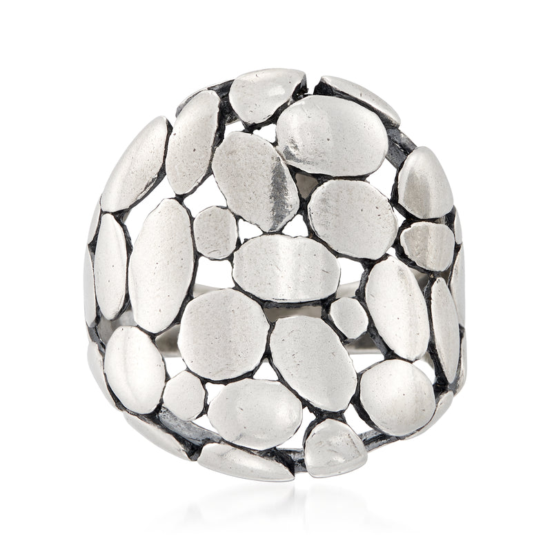 Sterling silver pebble-style ring with uneven rounded stone-like settings, polished finish