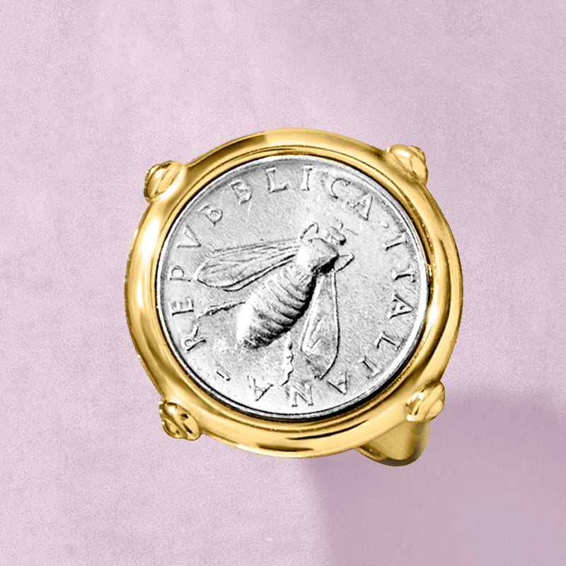 Gold-tone coin ring featuring silver-toned bee coin with ornate round bezel and setting