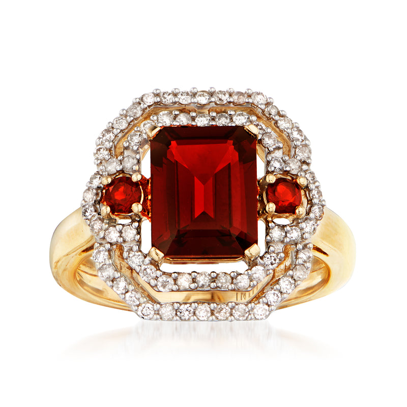 Yellow gold garnet and diamond ring, red emerald-cut center with diamond halo