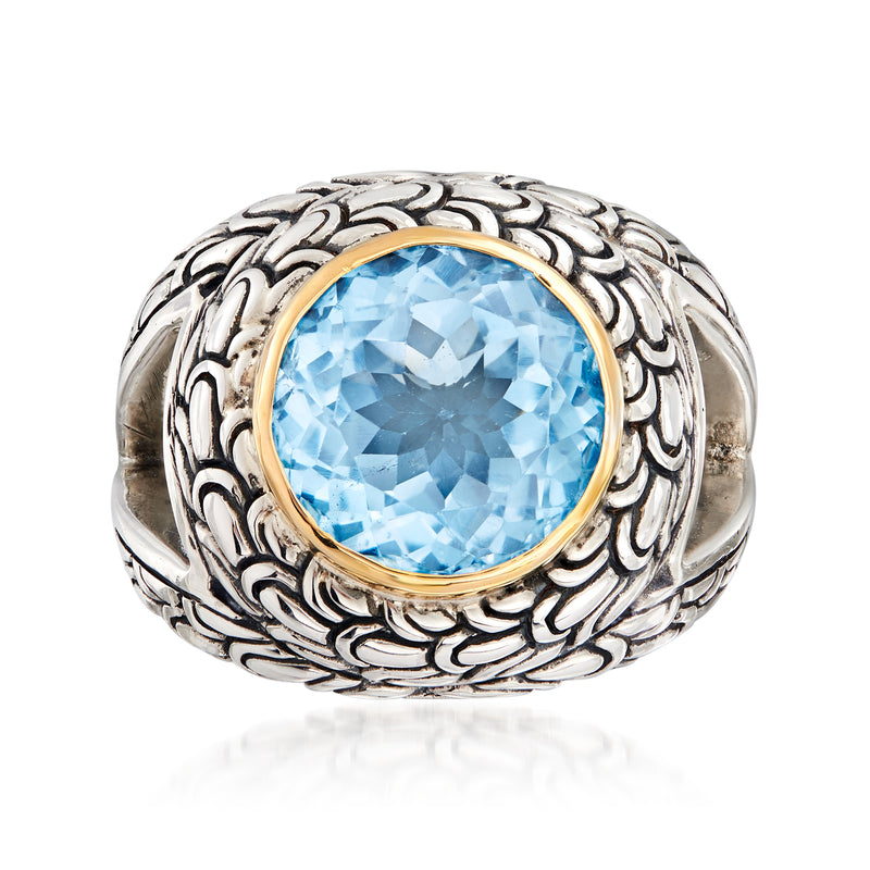 Sky blue topaz oval ring with scrollwork in sterling silver and 18kt yellow gold bezel