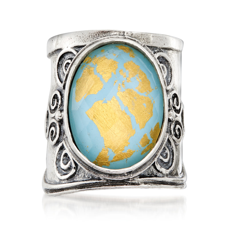 Sterling silver ring with oval turquoise and gold rock crystal cabochon