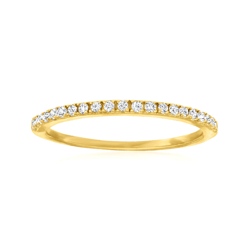 Gold diamond ring with round clear stones across the band, slim profile