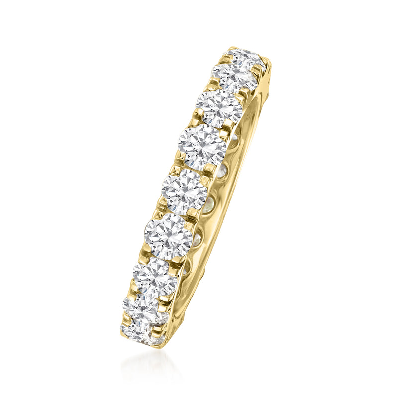 14kt yellow gold diamond eternity band, side view, round stones in gold prongs