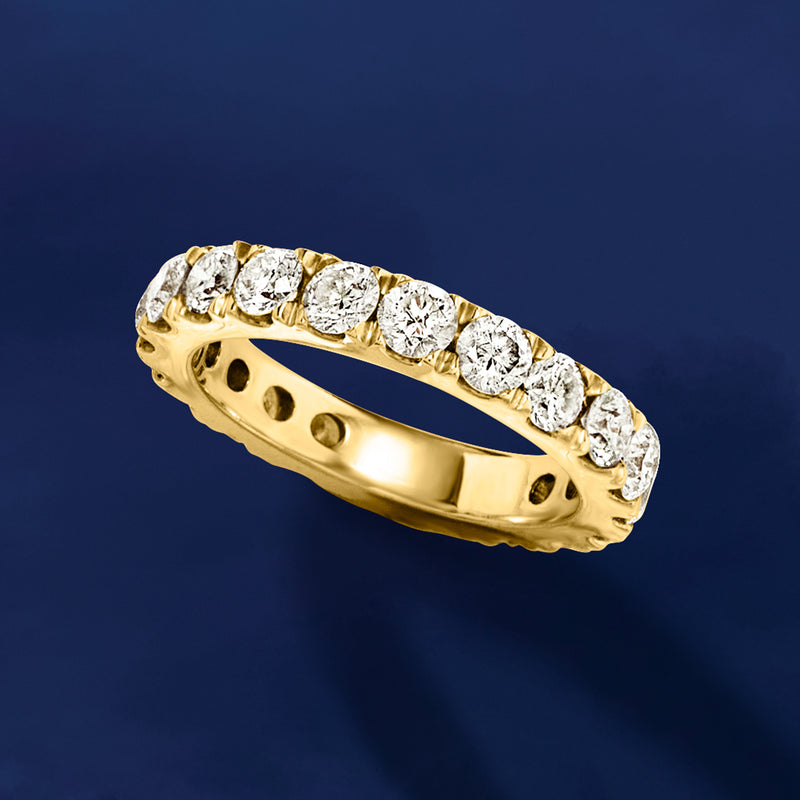 14kt yellow gold diamond eternity band, angled view, continuous row of round diamonds