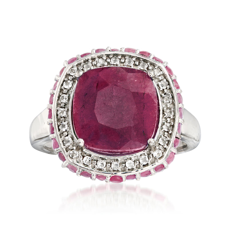 Sterling silver ring with oval ruby-style red gemstone, halo of clear stones and pink accents