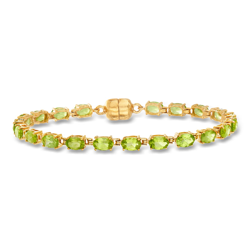 Peridot tennis bracelet in gold over sterling with oval green stones and magnetic clasp