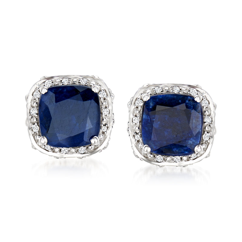 Sterling silver stud earrings with blue sapphire center stones and white topaz double frames
