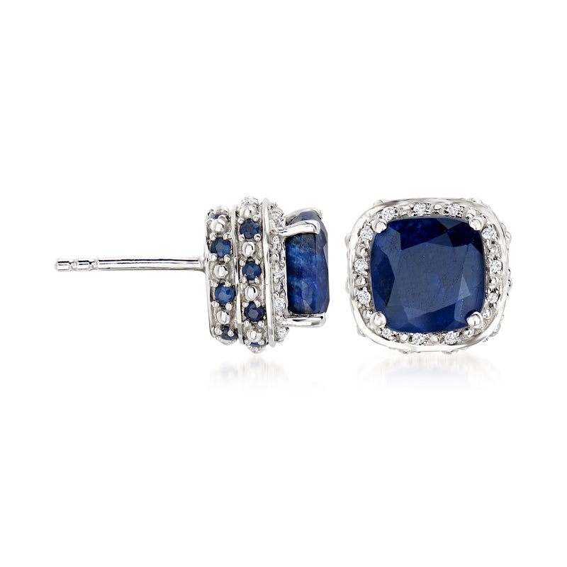 Sterling silver stud earrings with blue sapphire centers, white topaz halo, and visible posts