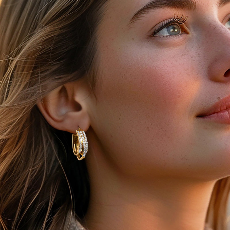 Three-row diamond hoop earrings in gold over sterling worn on model