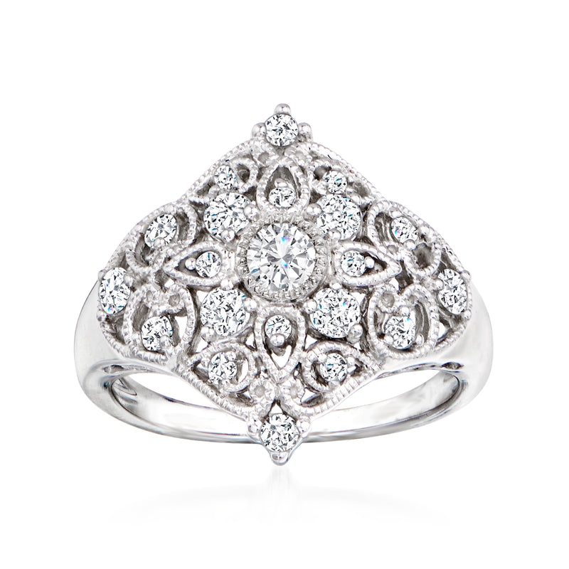14kt white gold diamond openwork floral ring with round center stone and halo