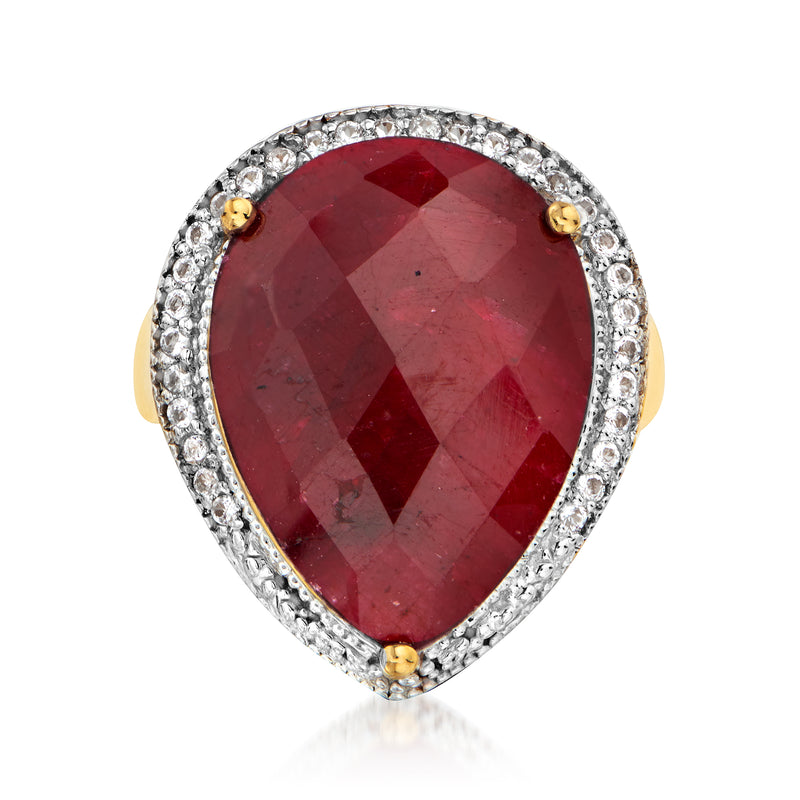 Pear-shaped ruby ring with white stone halo and gold prongs, silver band