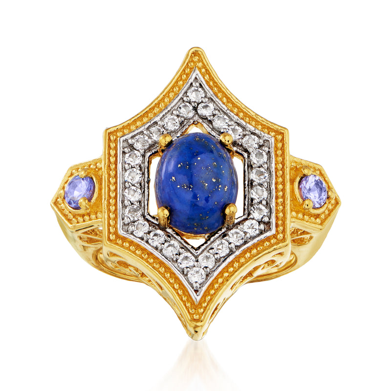Gold overlay ring with oval blue gemstone center, white stones halo and purple side accents