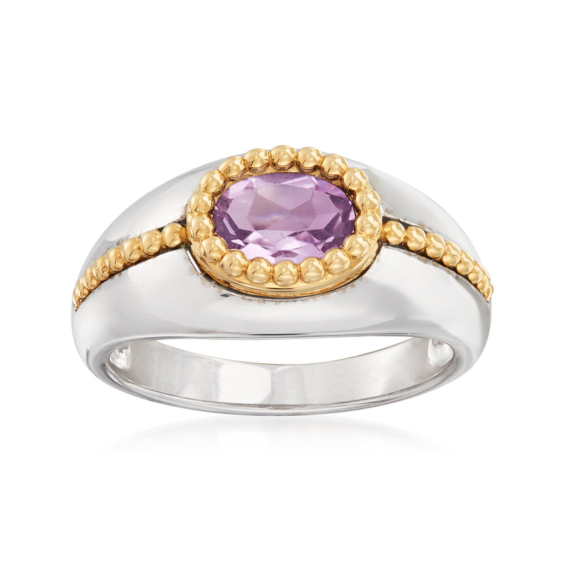 Amethyst oval ring with gold bezel and twisted gold accents on sterling silver band