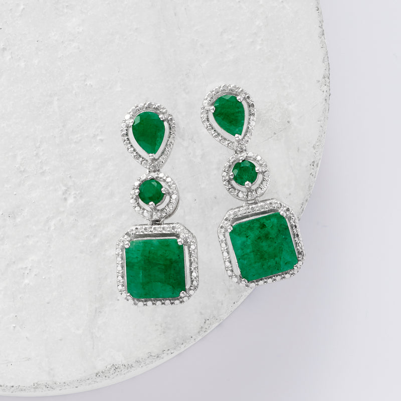 Emerald drop earrings in sterling silver with pear, round, and square green stones