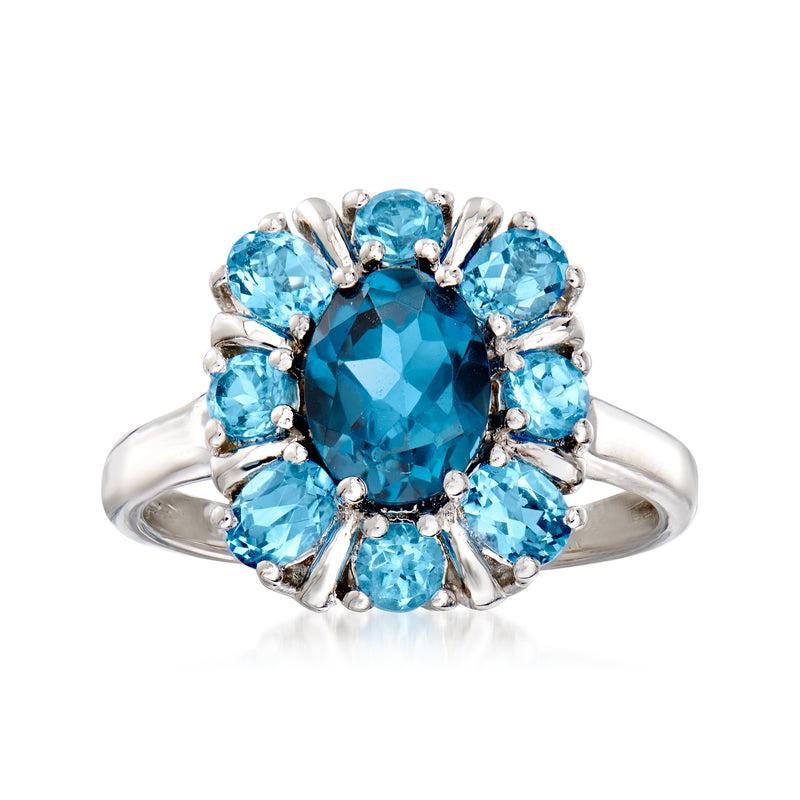 Sterling silver ring with oval London Blue and Swiss Blue topaz center and halo