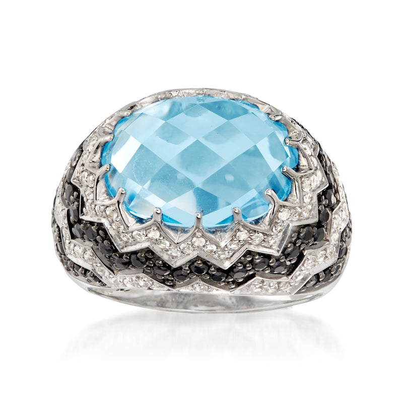 Sterling silver ring with large sky blue gemstone, clear halo and black stone accents