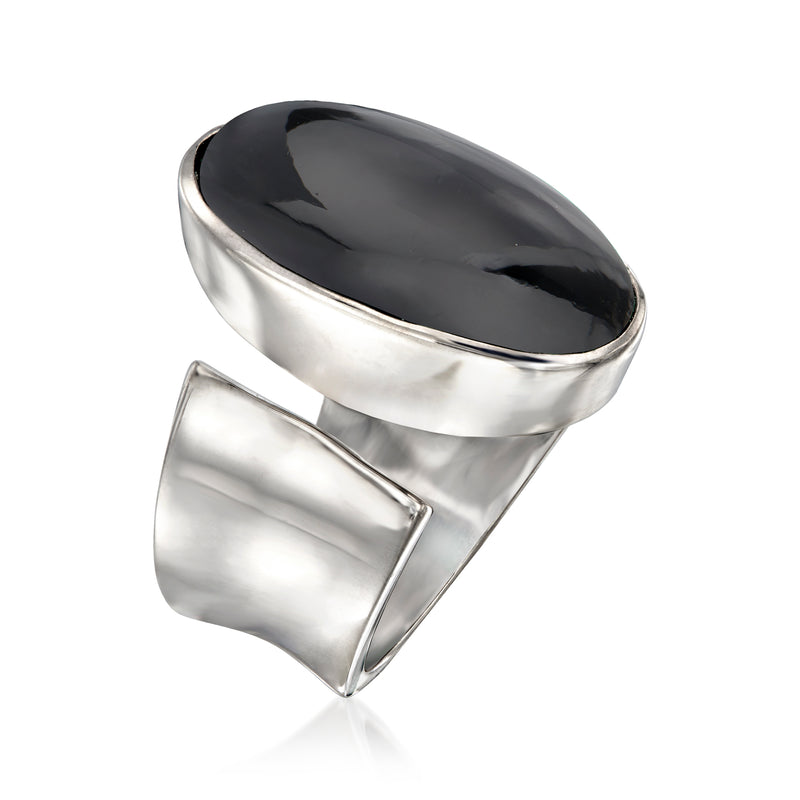 Sterling silver wrap ring with oval black onyx cabochon, side view