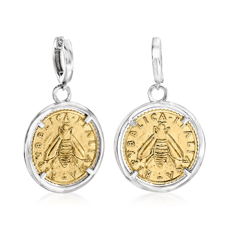 Coin drop earrings with hinged hoops and round gold-tone coin medallions in silver