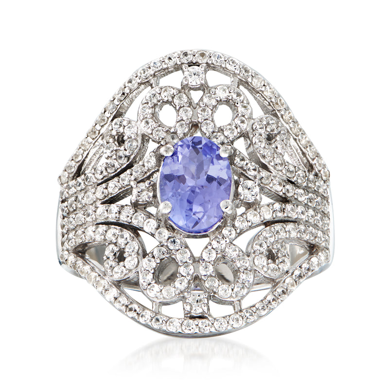 Sterling silver ring with oval tanzanite center stone and white zircon halo