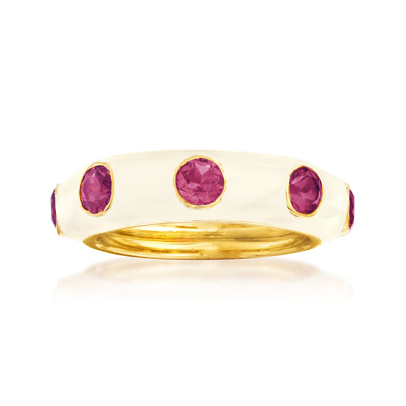 Gold-tone ring with three purple rhodolite garnets across the top bezel