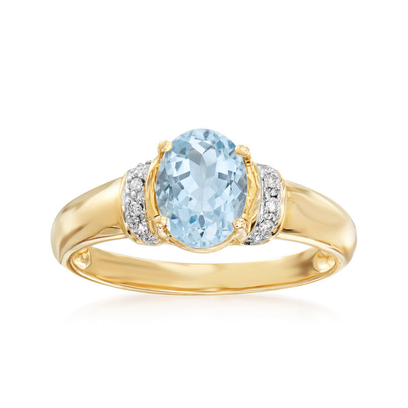 14kt yellow gold aquamarine ring with diamond halo, oval center stone