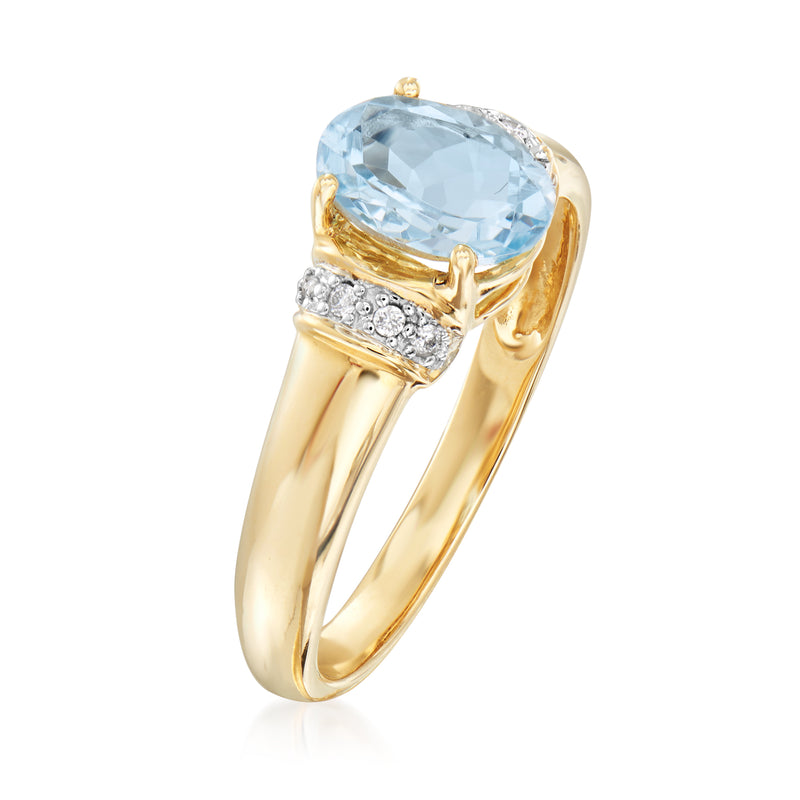 14kt yellow gold aquamarine ring, oval stone with diamond band detail