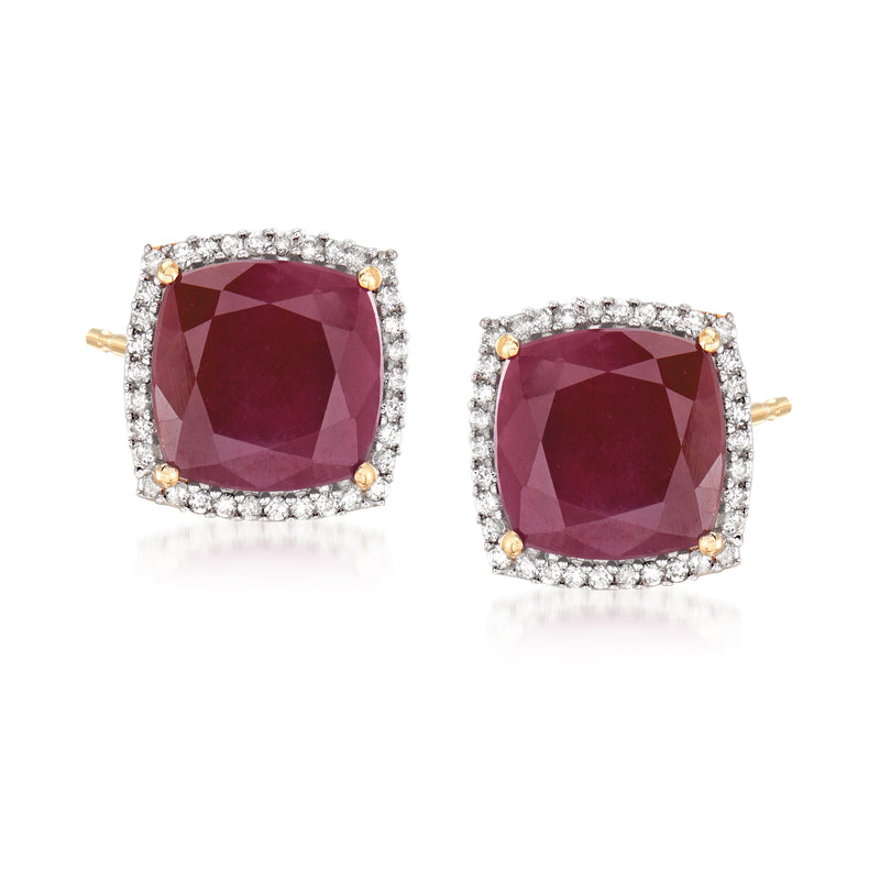 Yellow gold ruby and diamond stud earrings with cushion-cut center and halo