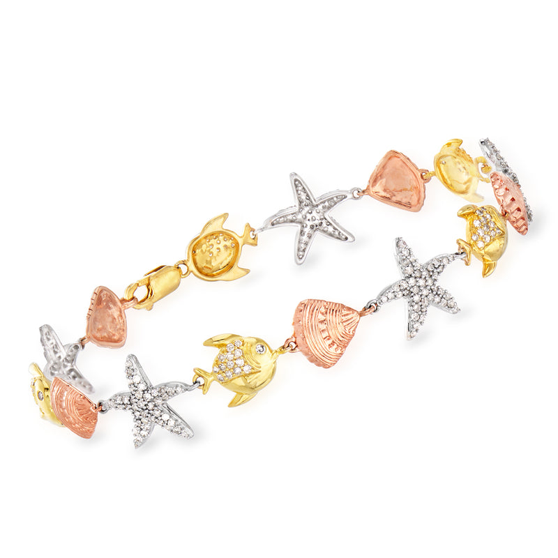 Tri-colored sterling silver sea life bracelet with starfish, fish & shell charms