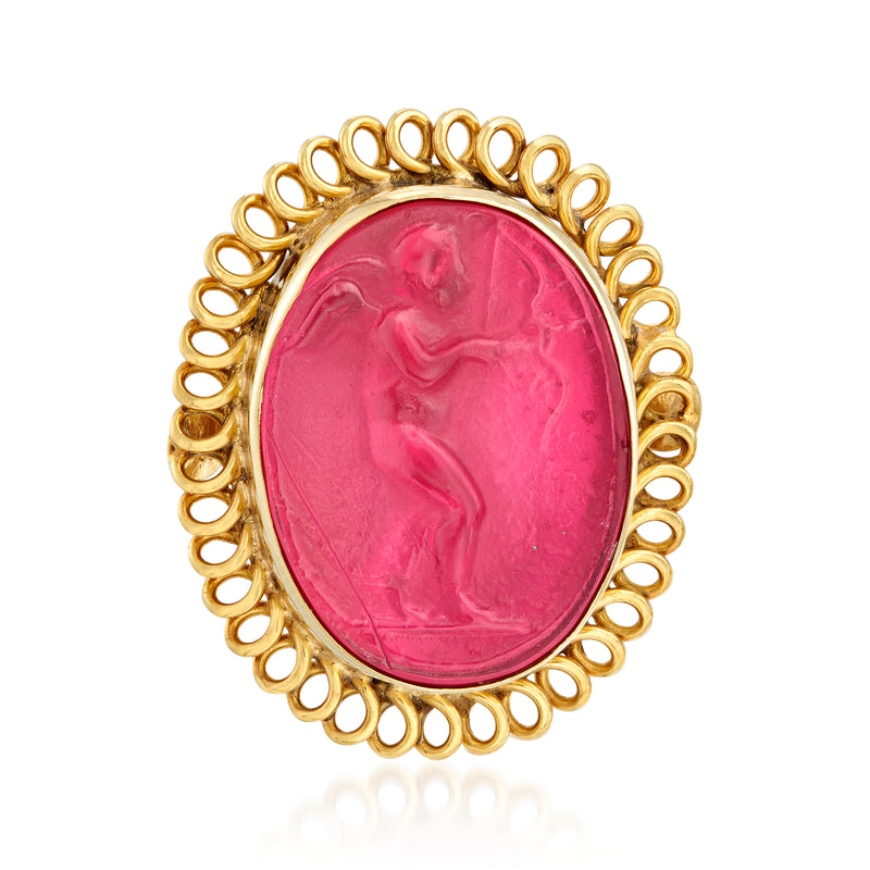 Oval red glass intaglio ring with ornate gold-tone bezel setting