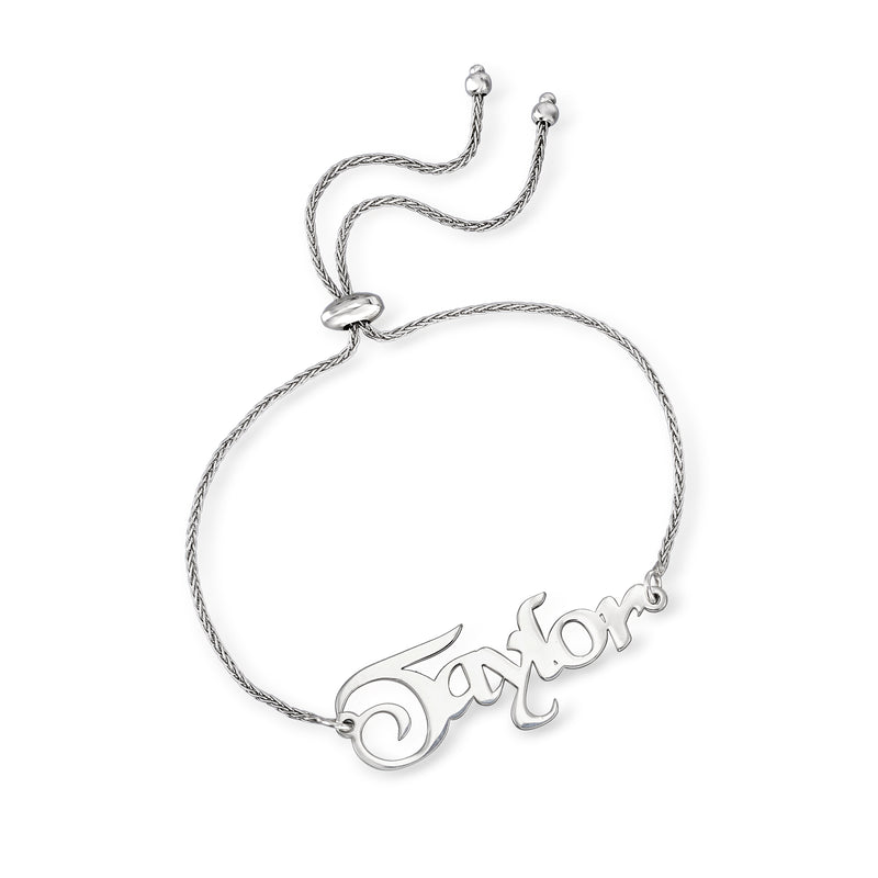 Sterling silver bolo bracelet with engraved script name plate 'Taylor' and braided cord