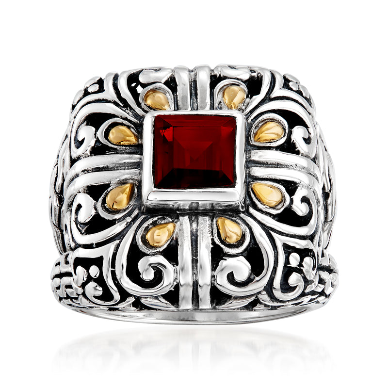 Sterling silver scrollwork ring with square red garnet center and yellow gold accents