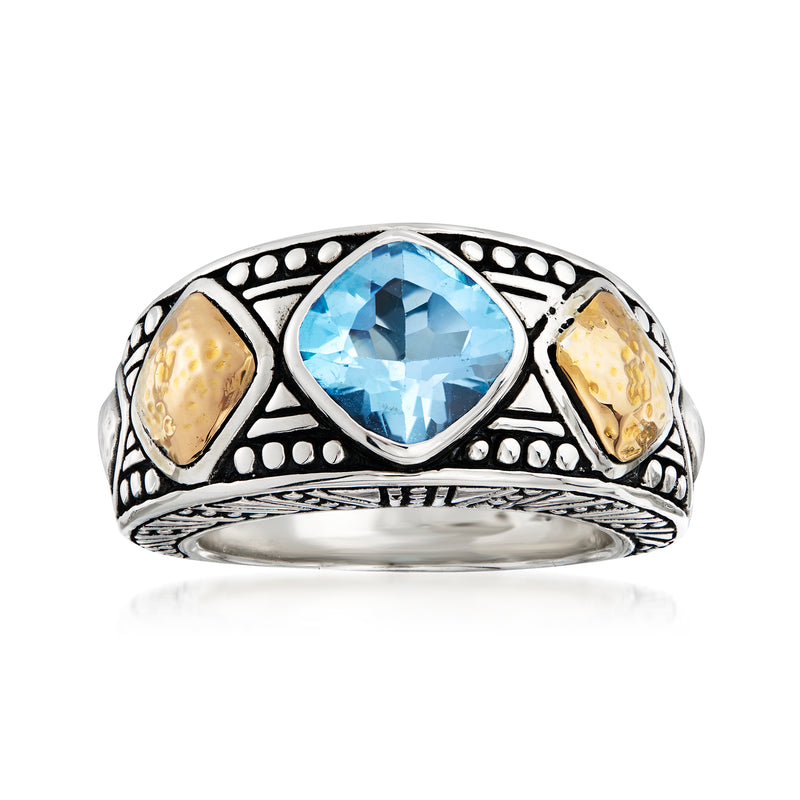 Oval sky-blue topaz ring in sterling silver with 18kt yellow-gold side inlays